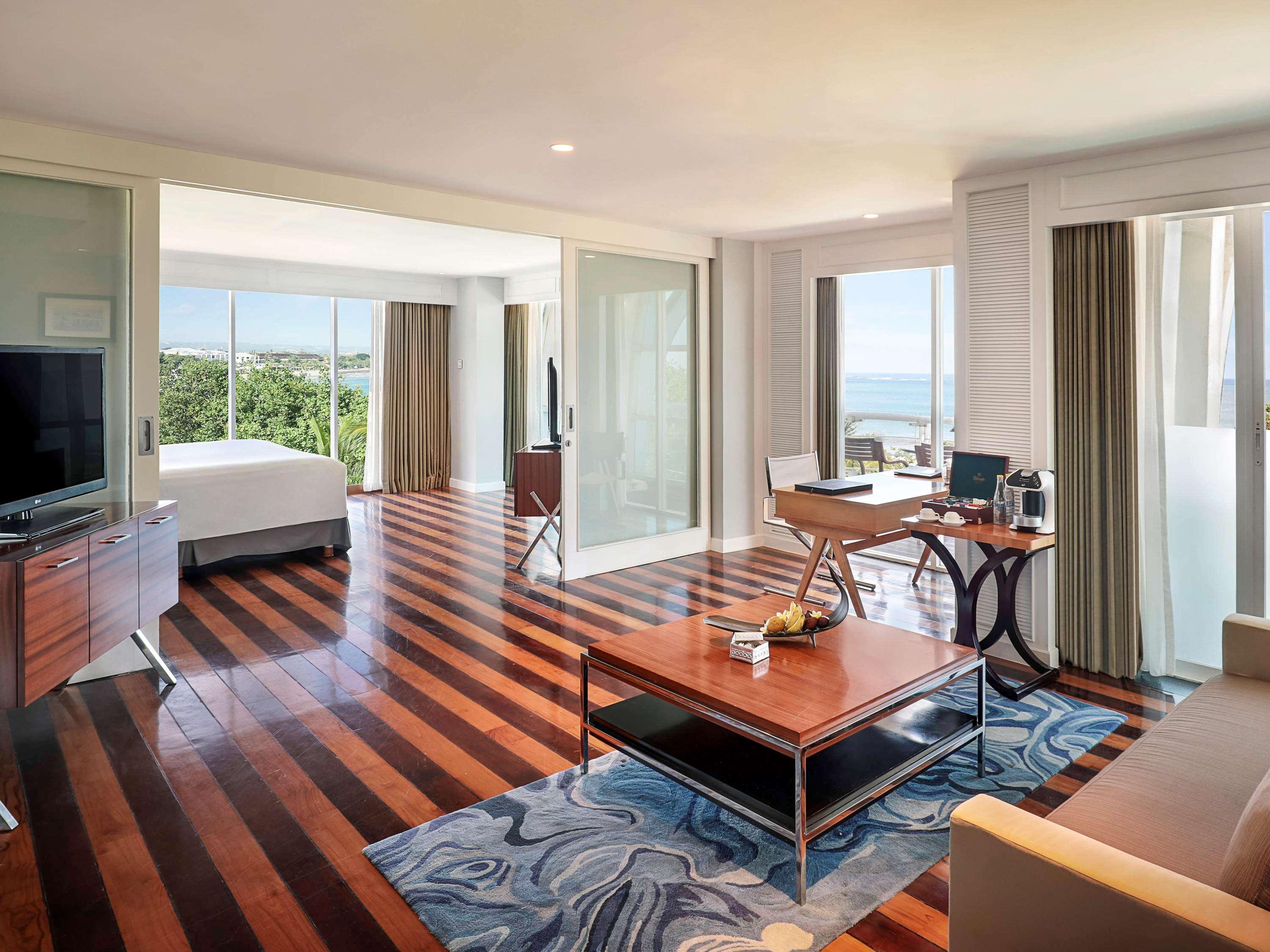 The Kuta Beach Heritage Hotel - Managed By Accor Exterior photo A suite at the hotel