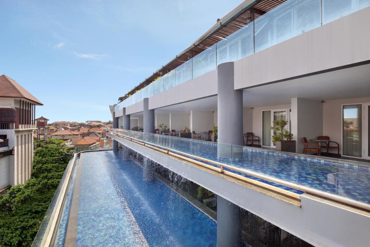 The Kuta Beach Heritage Hotel - Managed By Accor Exterior photo The swimming pool at the hotel